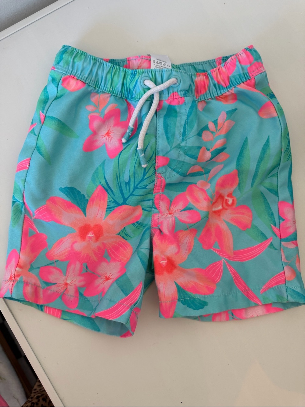 Cat and Jack Turquoise Floral Swim Trunks with Neon Pink Flowers